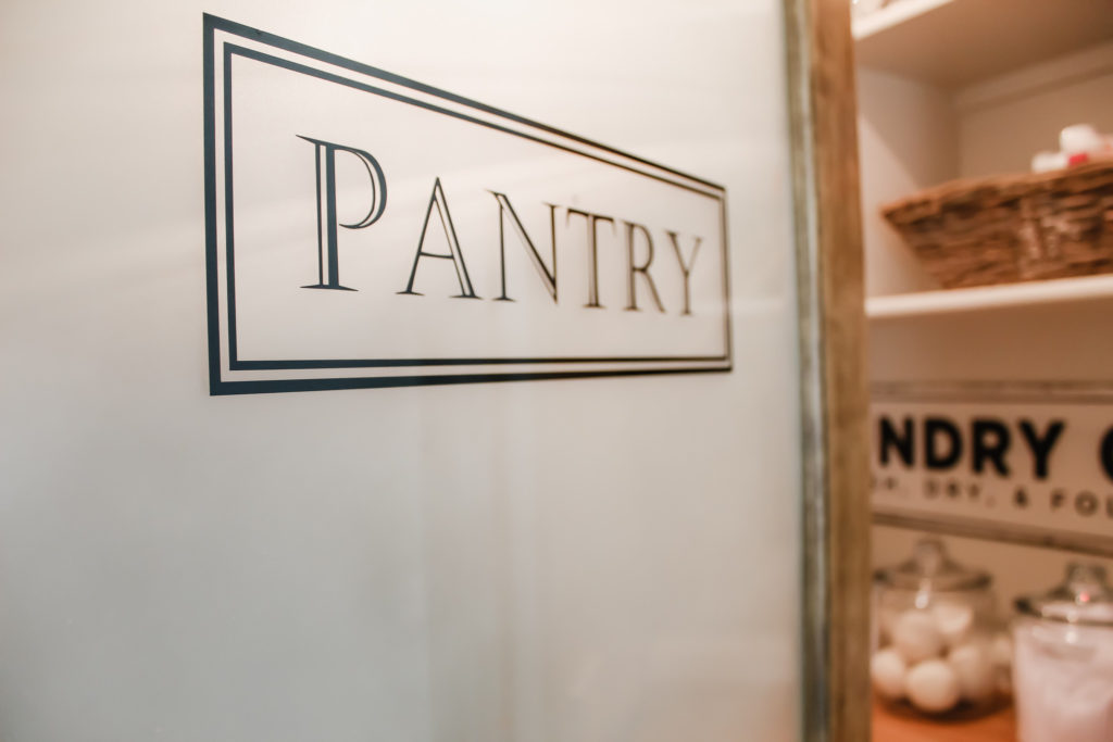 DIY Pantry and laundry farmhouse frosted door with label sticker and stained 3