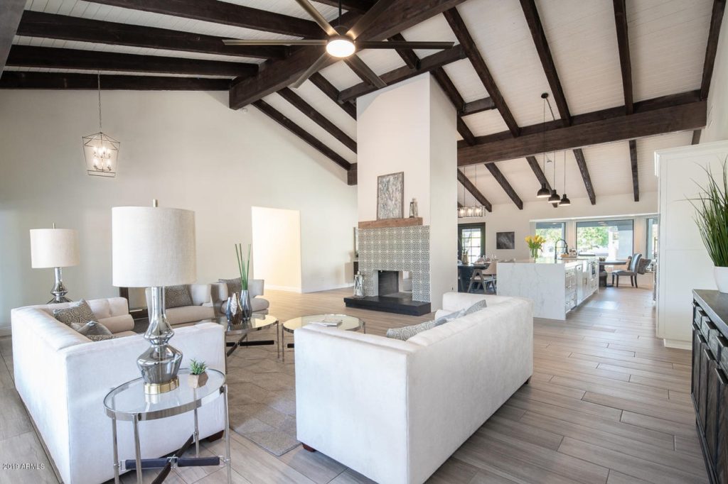 Modern farmhouse great room with wood beams