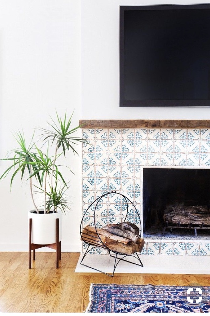 modern farmhouse fireplace blue patterned tile and natural unfinished floating wood shelf mantle