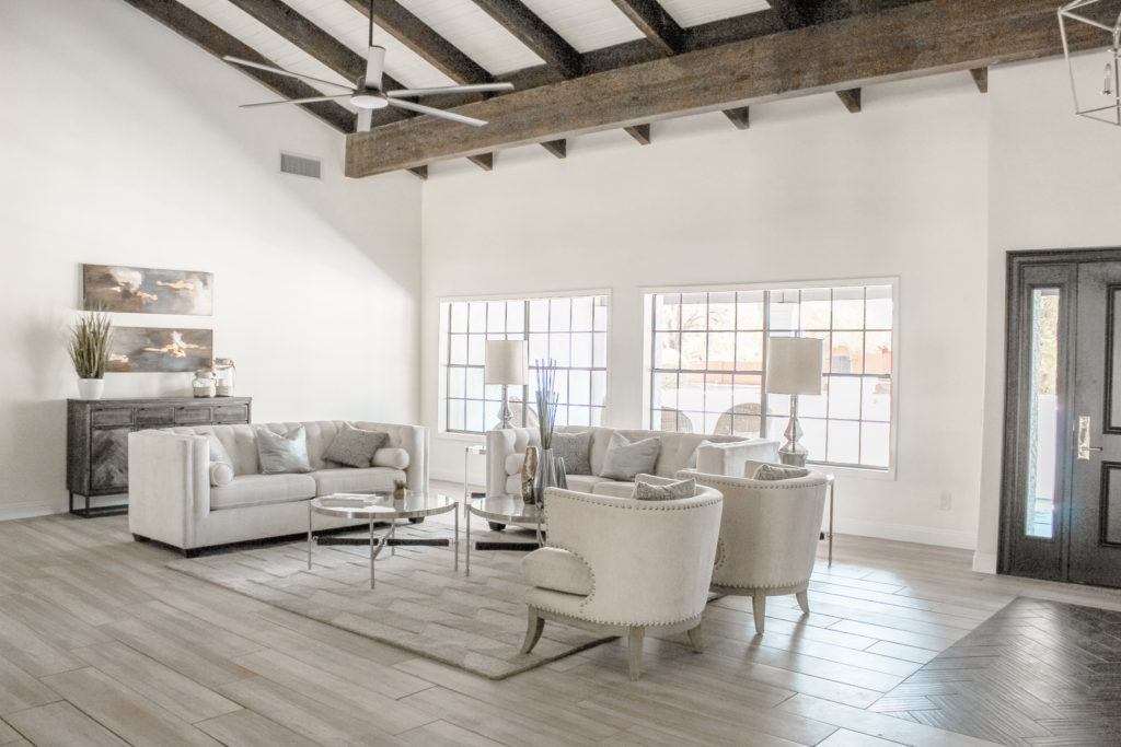 modern farmhouse great living room with wood beams