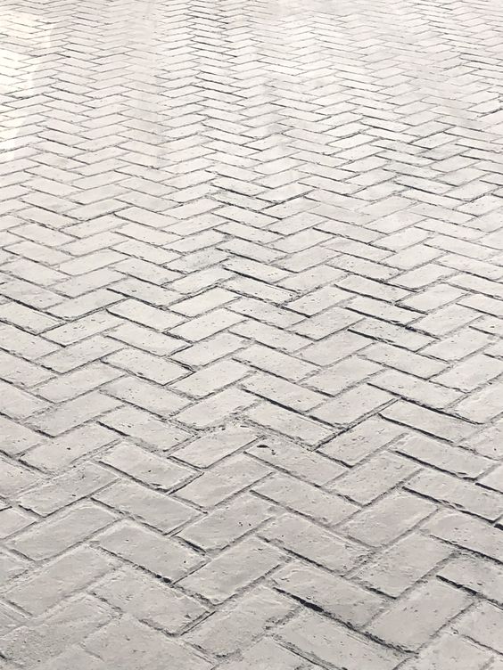 light herringbone stamped concrete