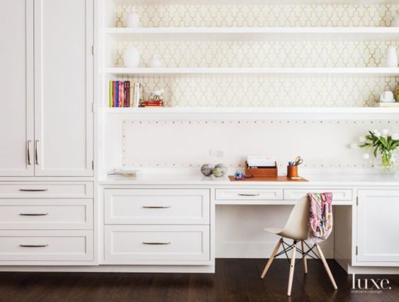 white built in desk with cabinets
